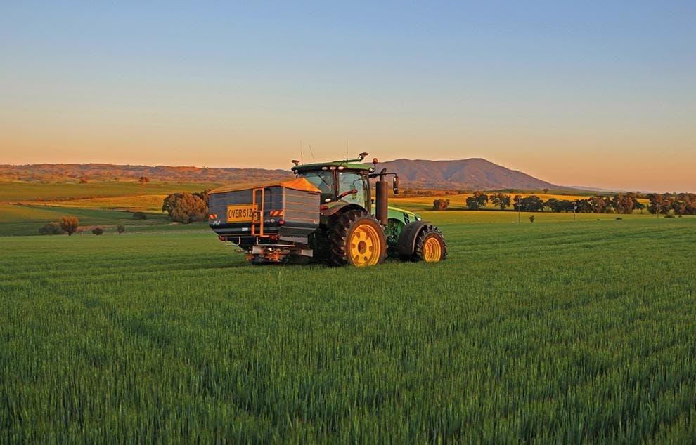 GPS-tracked agricultural machinery in a field